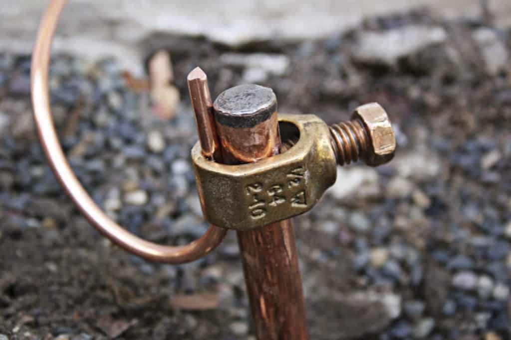 Linking The Copper Wire To The Grounding Rod